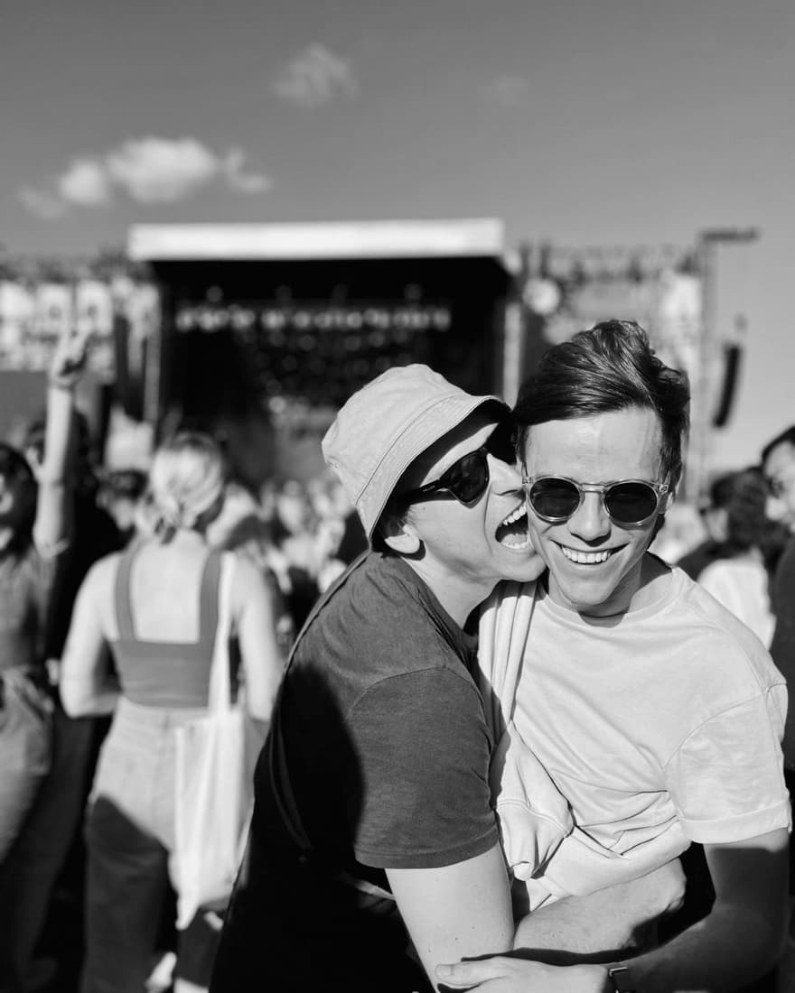 Gustaf and Magnus laughing at a summer festival